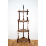 An late Victorian walnut etagere/whatnot