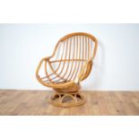 A retro vintage 20th Century swivel easy chair