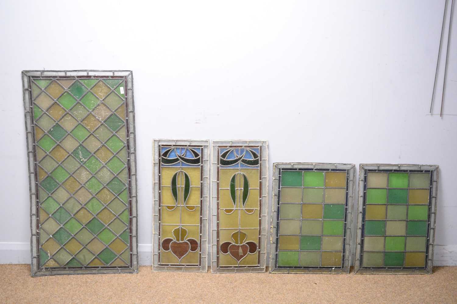 A selection of 19th Century stained leaded glass window panels.