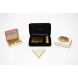1950s cosmetic brand pressed powder compacts in presentation cases