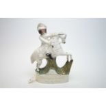 A Staffordshire flatback figure on horseback