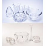 A selection of Orrefors, Sweden, clear glass bowls and vases; and other items