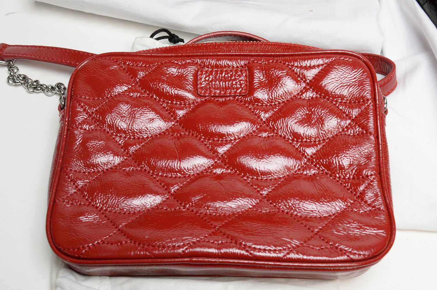 A Lulu Guinness quilted red leather handbag; together with two others - Image 2 of 4