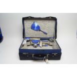 A Mappin & Webb Art Deco silver and enamel dressing table set.