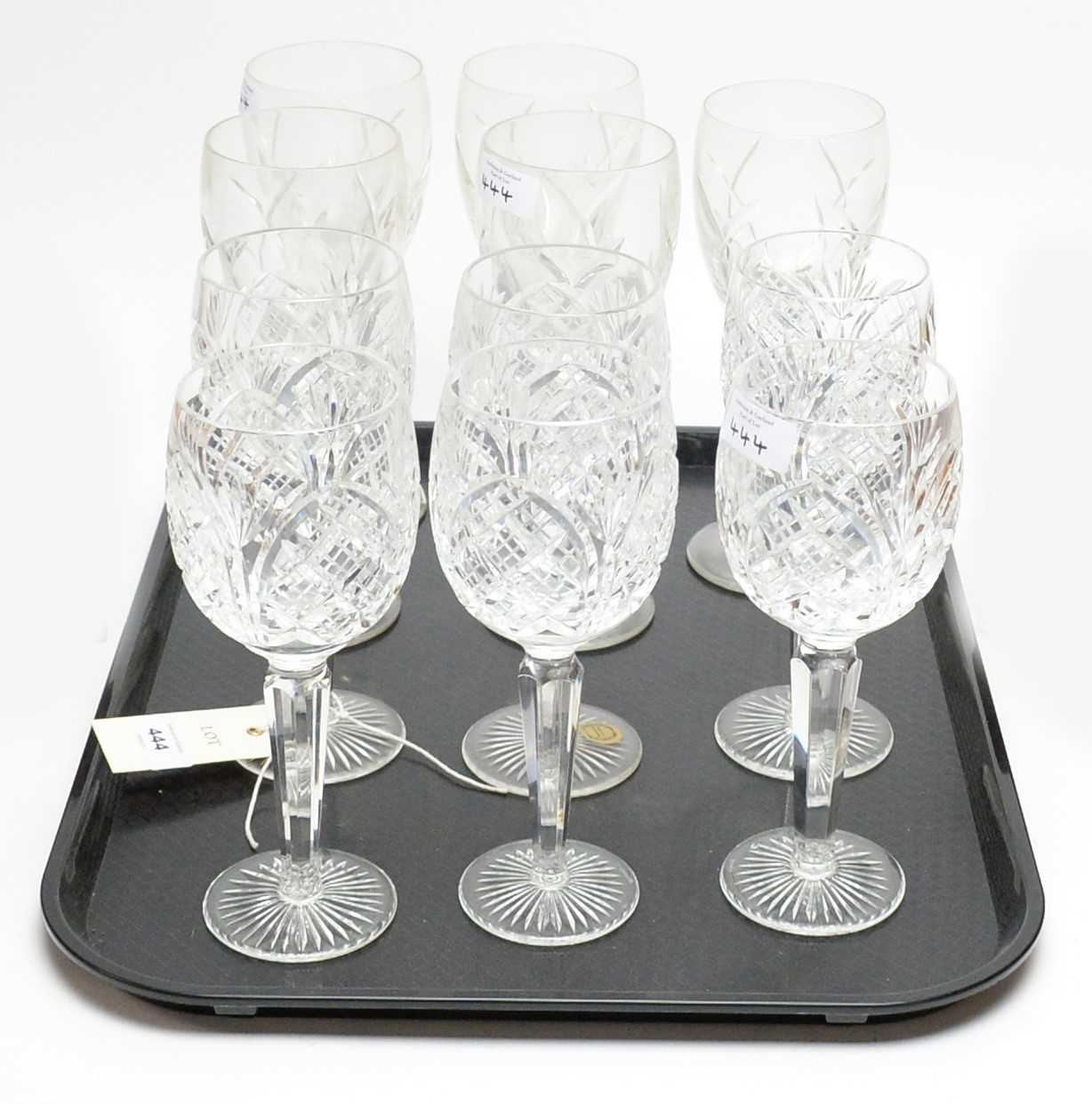 A set of six stemmed wine glasses; together with a set of five John Rocha wine glasses.