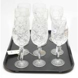 A set of six stemmed wine glasses; together with a set of five John Rocha wine glasses.