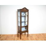 An early 20th Century Edwardian glazed china display cabinet vitrine