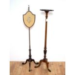 A 20th Century mahogany jardiniere stand with a pole screen