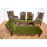 An Edwardian seven piece mahogany salon suite