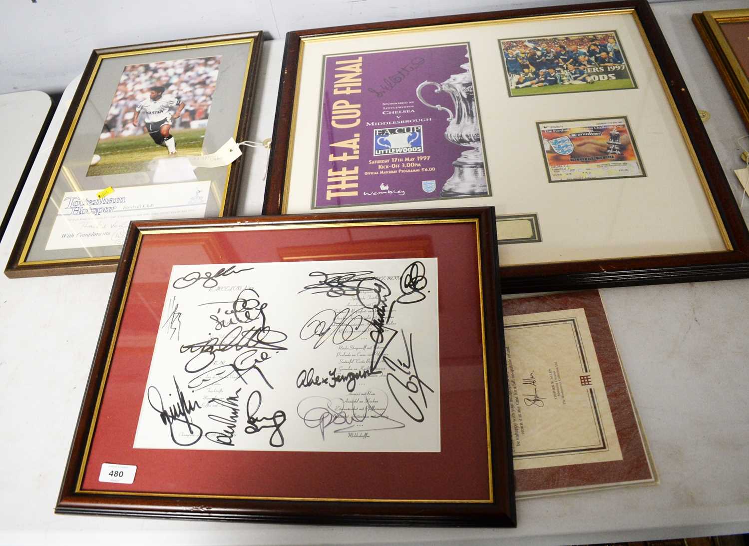 A selection of autographed football memorabilia.