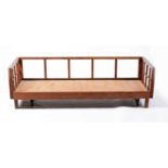 A retro style teak daybed