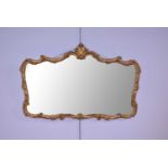 A contemporary gilt framed Baroque style wall mirror