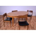 A retro vintage mid 20th Century chairs by Beautility; and a table