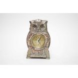 A 1930s silver plated owl mantel clock