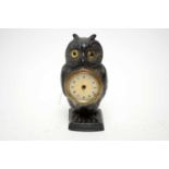 A 1930s owl miniature mantel clock