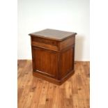 A 20th Century mahogany pedestal music cabinet