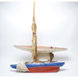 Two hand painted model sailing boats