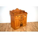 An early 20th Century pine sideboard/credenza