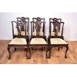 A set of six 20th Century mahogany dining chairs in the manner of Chippendale