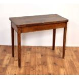 An early 20th Century Edwardian oak tea table