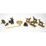 A collection of brass dog collectibles