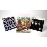 11 Beatles, Queen, and Bowie LPs