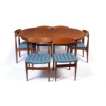 G-Plan: a mid Century extending dining table; and six mid Century dining chairs.