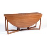 Peter Hvidt & Orla Mølgaard-Neilson for France & Son: a teak double gateleg drop leaf table.