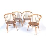 Ercol: a set of four No. 449A Windsor bow-top armchairs.