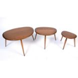 Ercol: a model 354 beech and elm set of 'Pebble' nesting tables.