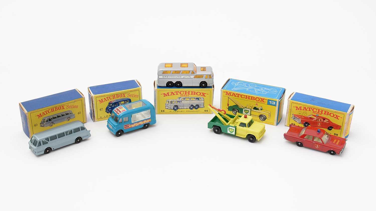 Five Matchbox Series diecast vehicles,