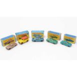 Five Matchbox Series diecast vehicles,