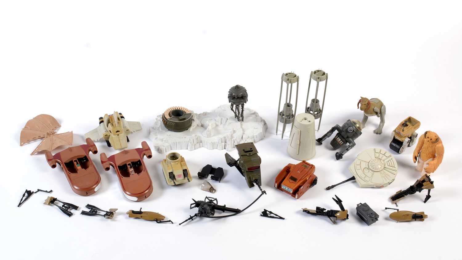 Various Kenner Star Wars figures; and other small vehicles.