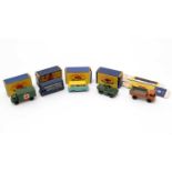 Five Matchbox Series diecast vehicles,