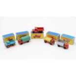 Five Matchbox Series diecast vehicles,