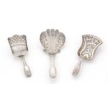 Three silver caddy spoons.