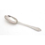 A Queen Anne silver wavy-end or dog-nose tablespoon.