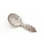 A Victorian silver engraved caddy spoon.