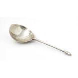 A rare medieval silver acorn knop spoon.