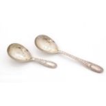 A Victorian silver Provincial caddy spoon and matching sugar spoon.