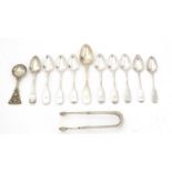 Various Scottish spoons and sugar tongs.