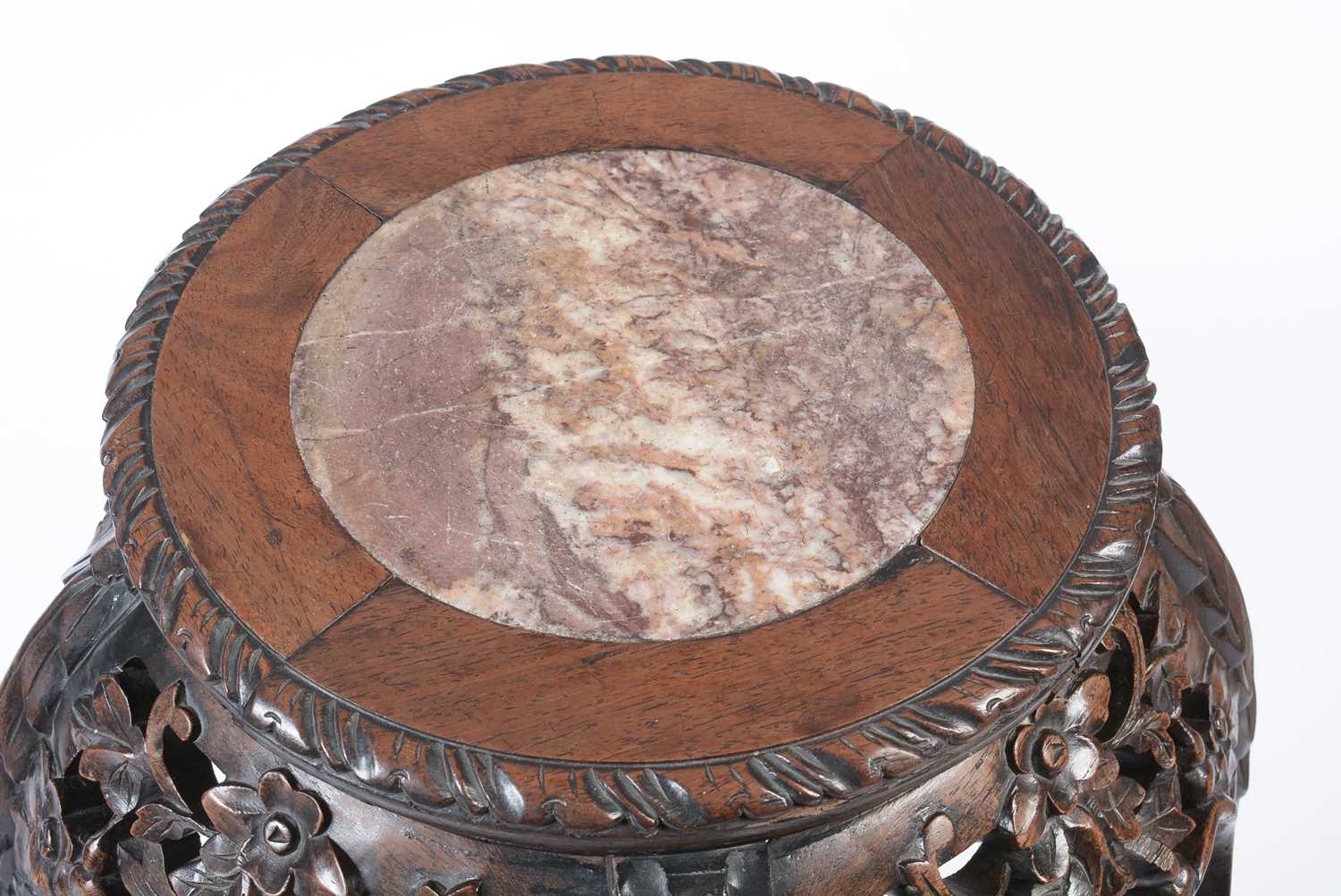 A Chinese carved hardwood circular jardiniere stand. - Image 2 of 17
