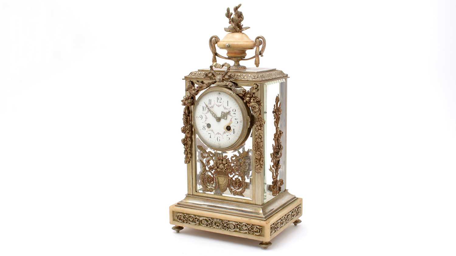 A 19th Century French gilt bronze four-glass eight day mantel clock