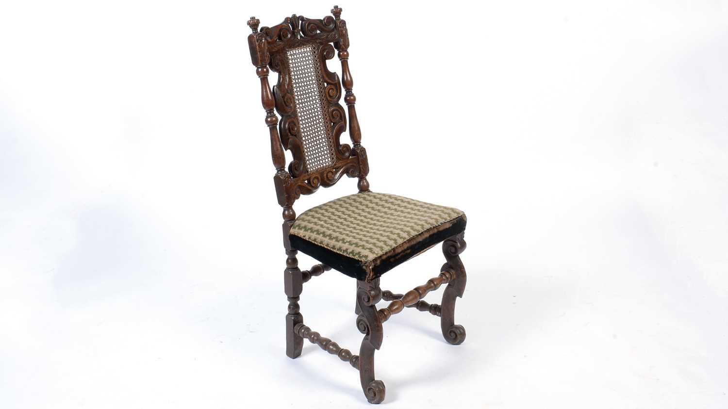 A late 17th Century carved oak chair.