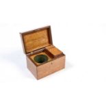 An early 19th Century maple tea caddy,