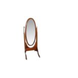A large Edwardian mahogany and barber pole strung cheval mirror.
