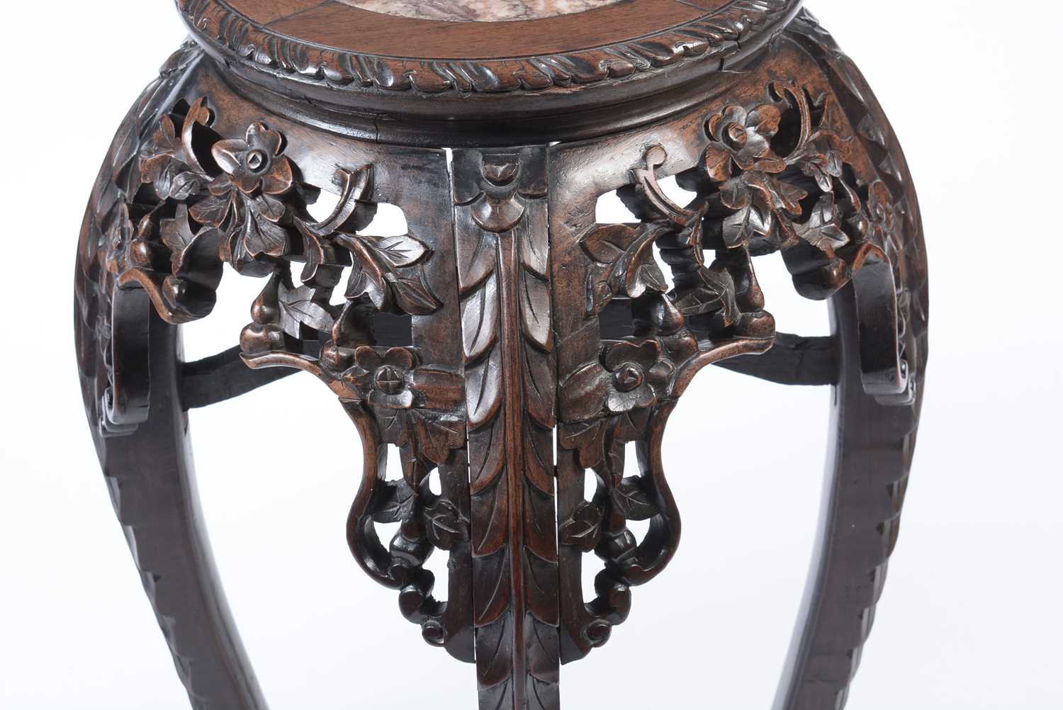 A Chinese carved hardwood circular jardiniere stand. - Image 7 of 17