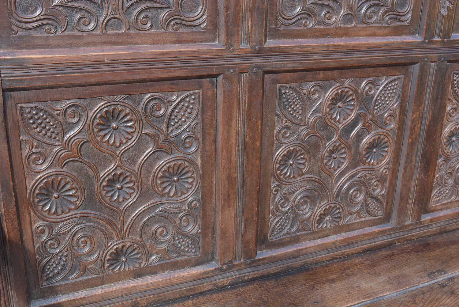 A North Country joined and carved oak box settle. - Image 2 of 13