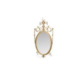 A Georgian-style oval giltwood mirror.