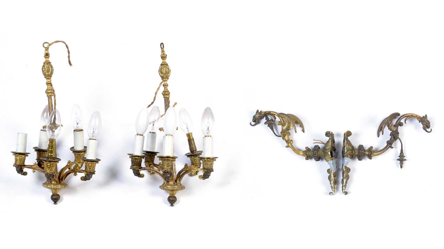 A pair of French Empire-style ormolu hanging wall lights and brackets